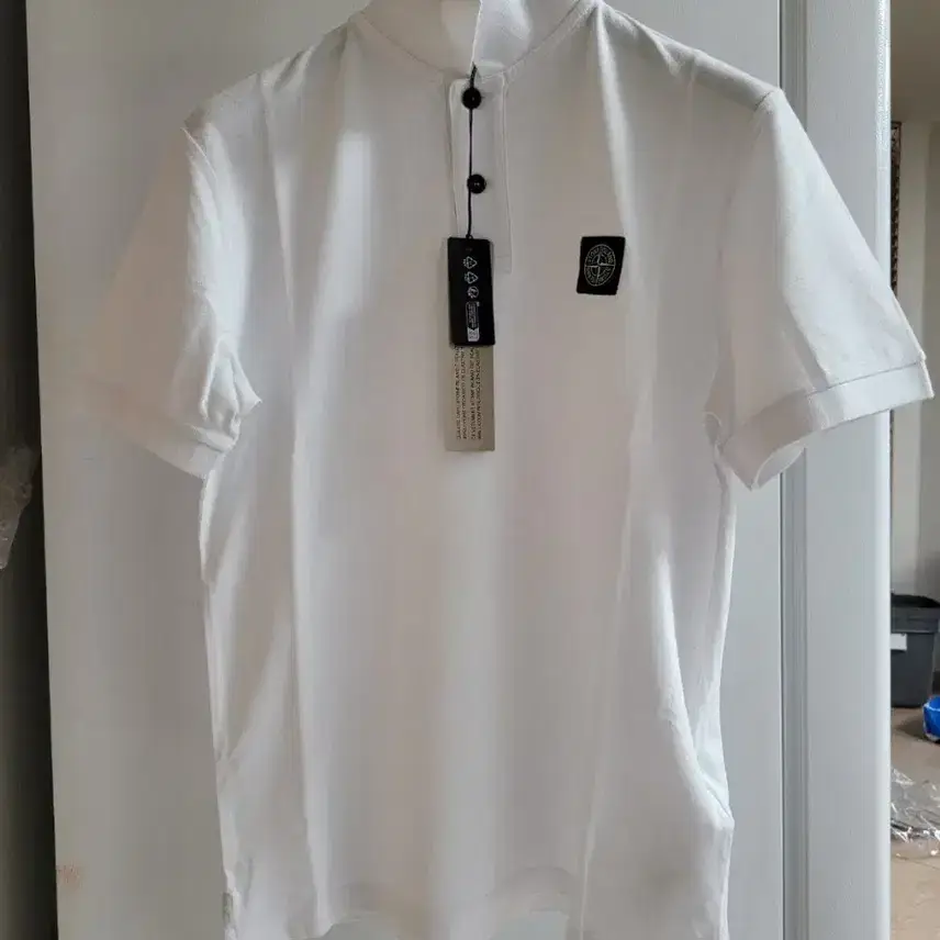 เสื้อโปโลผ้าปิเก้ออร์แกนิกทรงสลิมฟิต ยี่ห้อ Stone Island ของแท้ใหม่เอี่ยม
