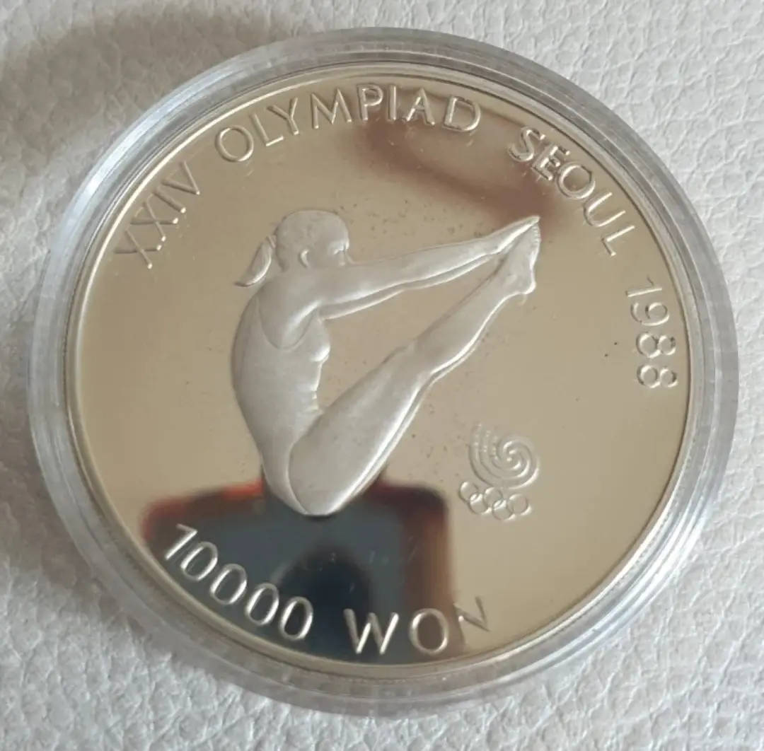 Памятная серебряная монета Олимпийских игр в Сеуле 1988 года